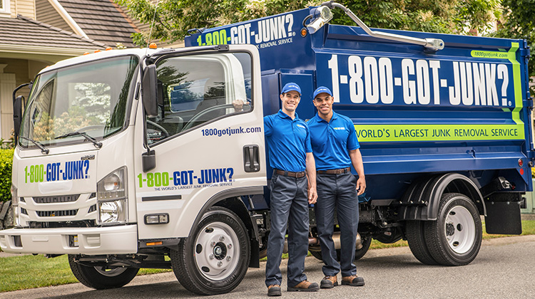 1-800-GOT-JUNK? Truck team ready to take away your old washer and dryer 1-800-GOT-JUNK? Truck team ready to take away your old washer and dryer