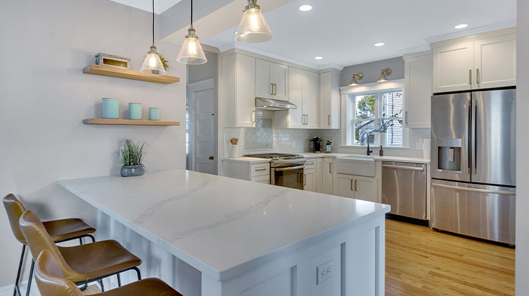 kitchen with white island and cupboards kitchen with white island and cupboards