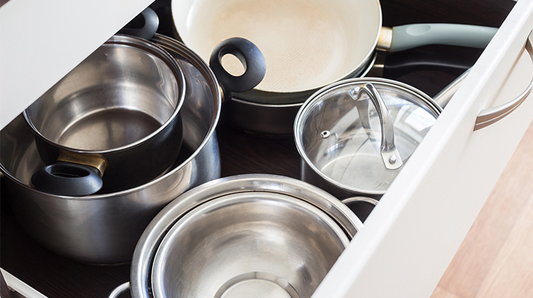 Pots and pans organized in a drawer Pots and pans organized in a drawer